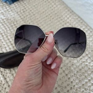 BCBG MAXAZRIA 
SILVER AND BLACK SUNGLASSES